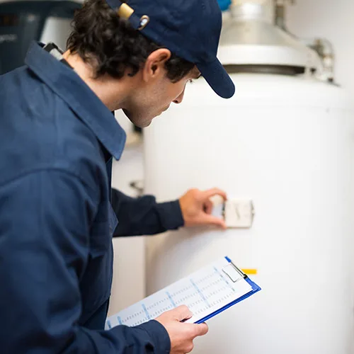 Inspecting a water heater in a rental property